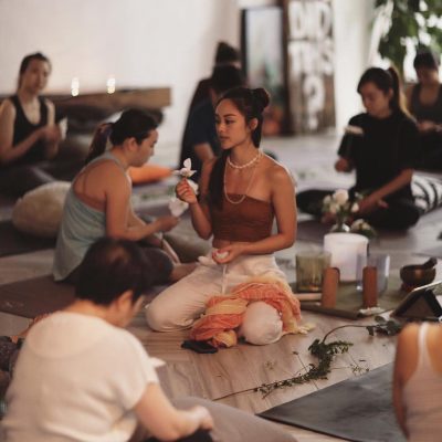 Official logo of Miraclevie Sound Healing with a sunburst and crescent moon design surrounding an 'M'.